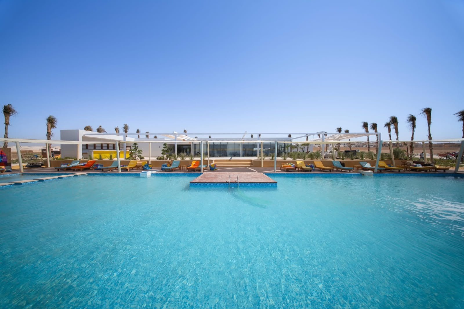Cali Coast pool, clubhouse and landscaped grounds